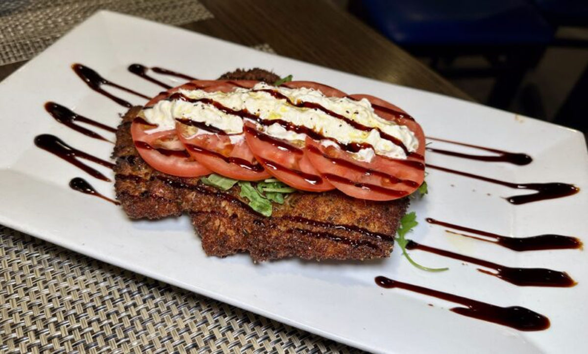 Jolie pork Milanese with tomato and stracciatella